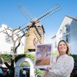 Marie with a Monet painting in Montmartre