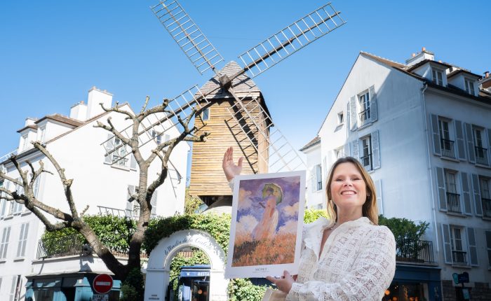 Marie with a Monet painting in Montmartre