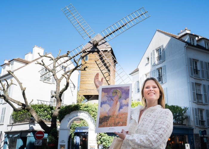 Marie with a Monet painting in Montmartre