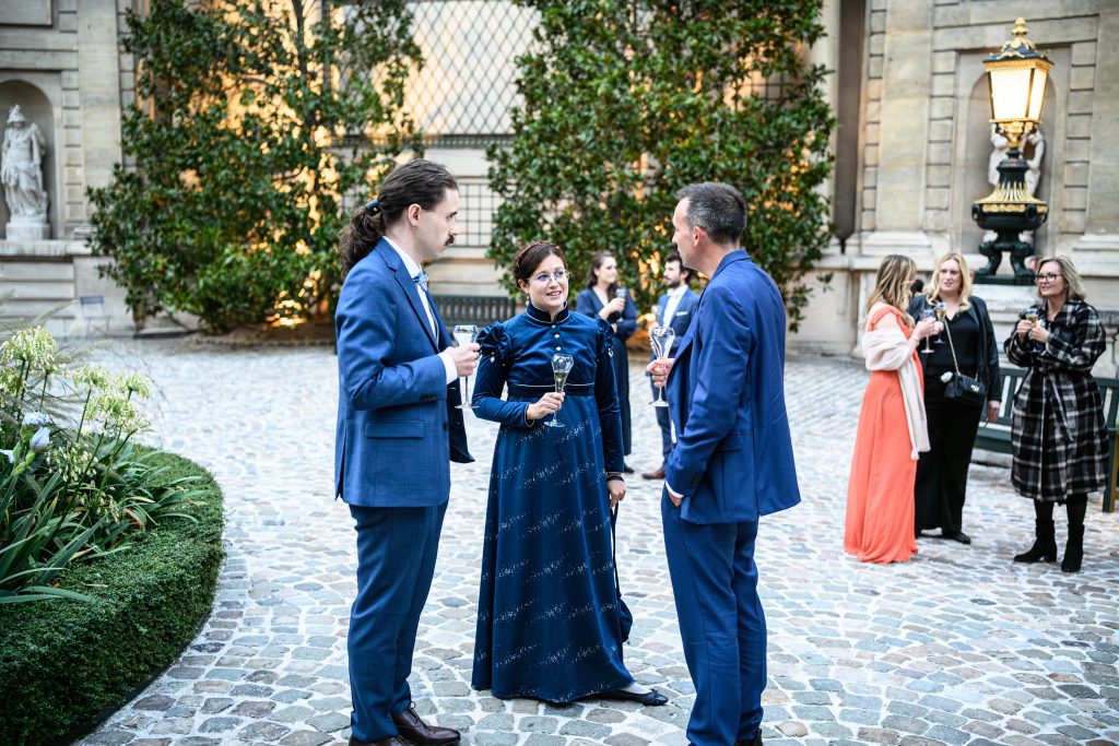 Guests chatting outside the Musée Jacquemart-André.