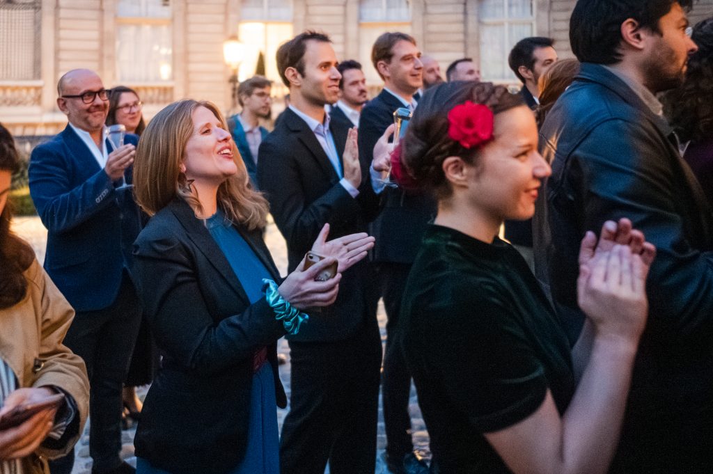 Guests listening to speeches.