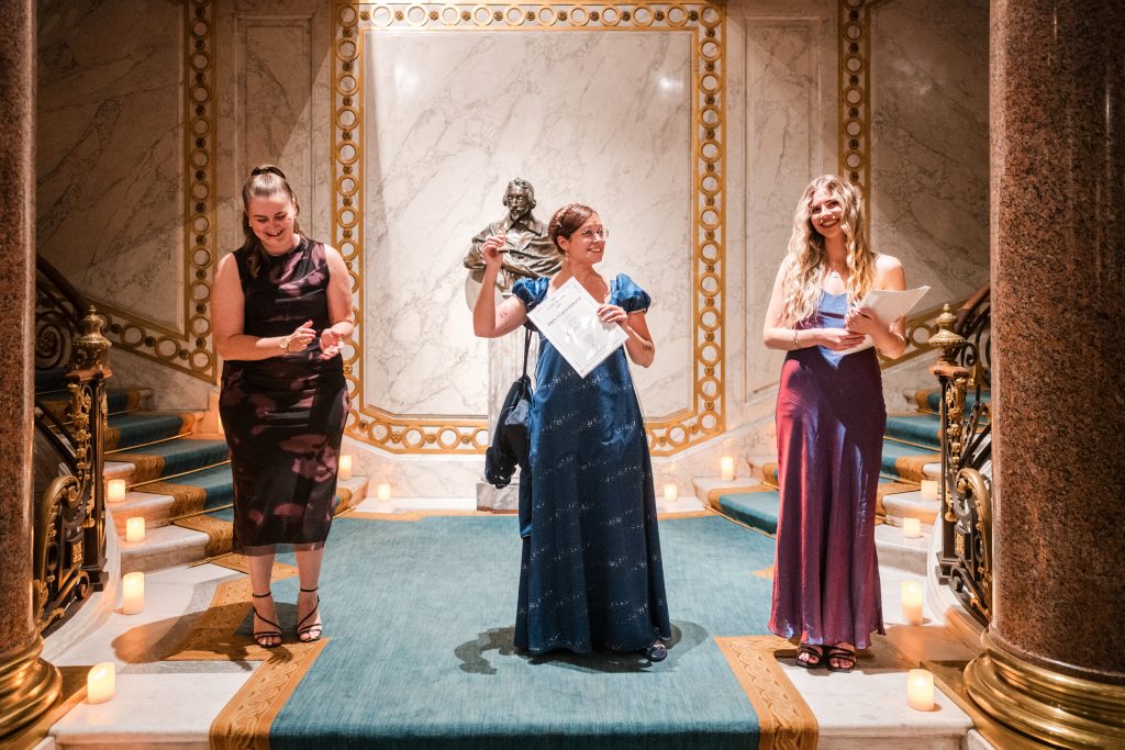 Guide Laure Nermel receiving her award.