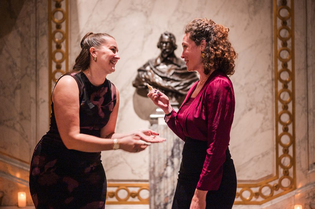 MPP Guide Flora receiving her award.