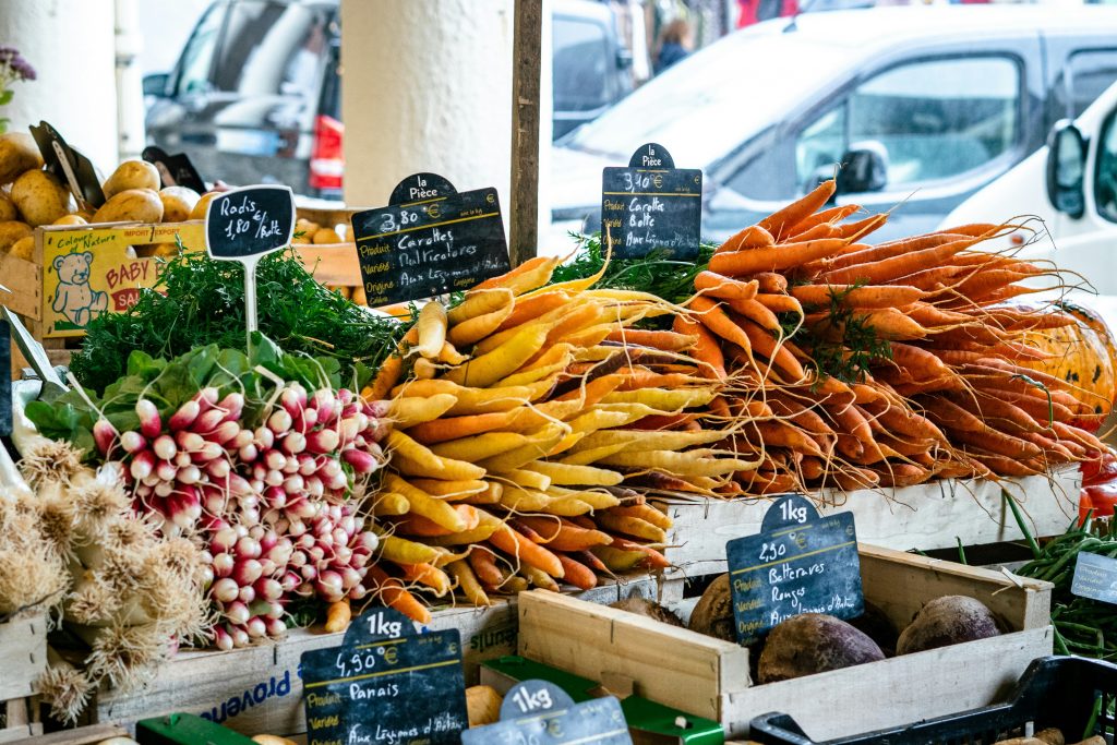 Vibrant fresh produce for sale in a local, French market stall. 