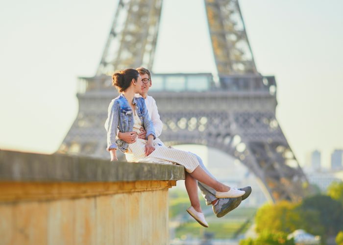 Couple outside Eiffel Tower