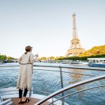 Women cruise river boat Paris Eiffel tower My private paris Sunny day