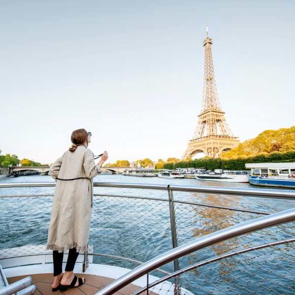 Women cruise river boat Paris Eiffel tower My private paris Sunny day