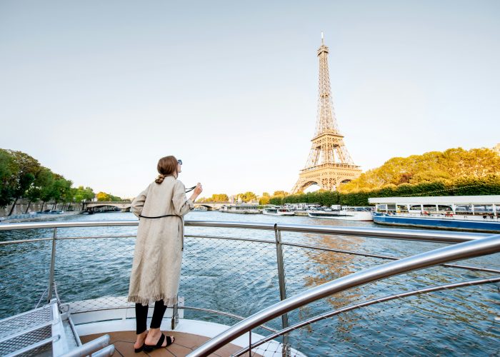 Women cruise river boat Paris Eiffel tower My private paris Sunny day