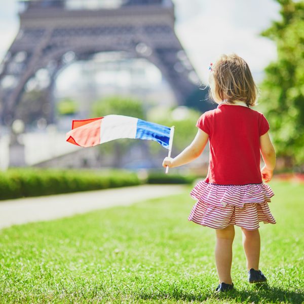 Small girl in paris spring time Eiffel Tower My Private Paris french flag