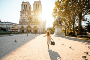 Women running Sunset Notre Dame cathedral MY private Paris