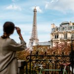 The Top of the eiffel Tower women Watching the monument my private paris