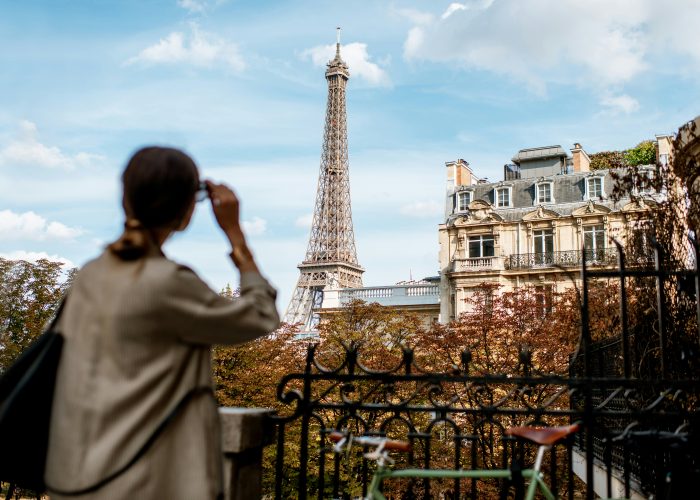 The Top of the eiffel Tower women Watching the monument my private paris