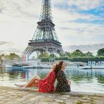 Spring in paris My private paris Twi ladys in a pretty dress In front of the Eiffel Tower
