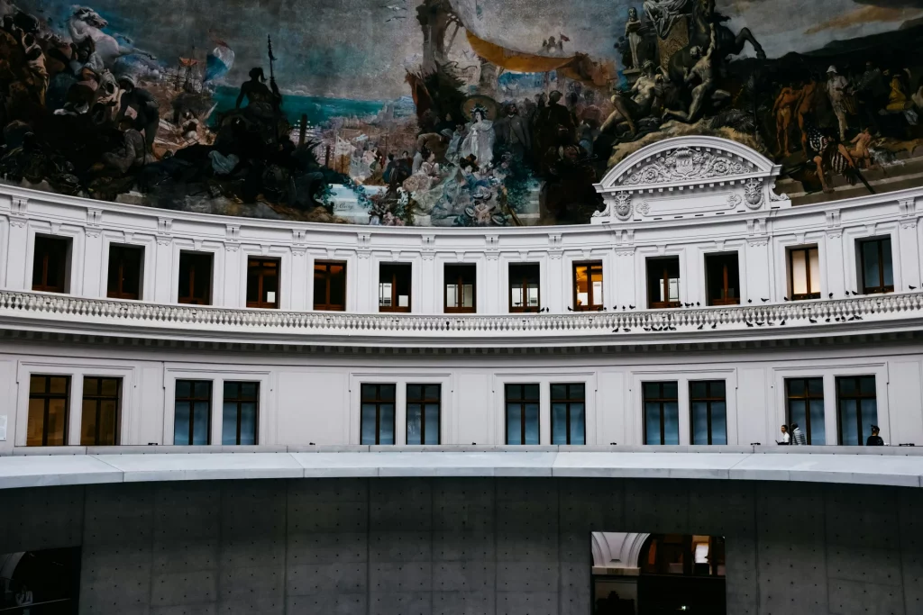 Inside the Commerce de Bourse Museum in Paris Rotonde circle bulding with paintings on the ceiling