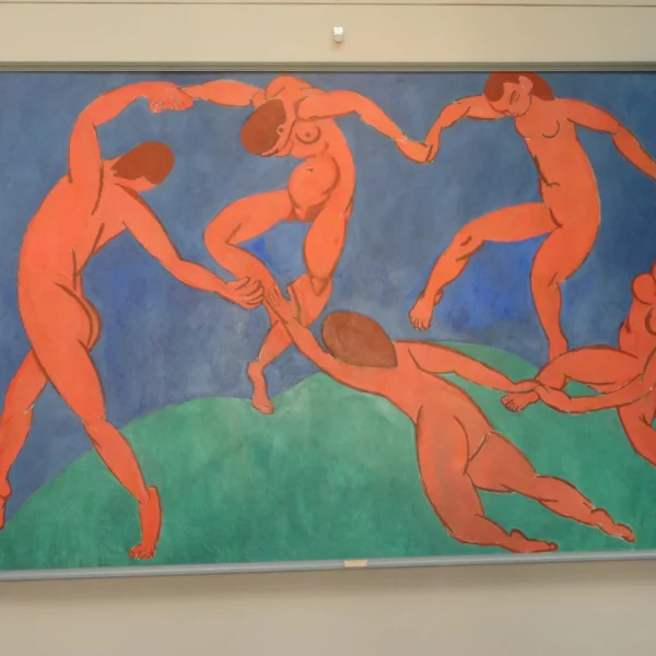 The Dance, a painting created by Matisse in 1910. With persons dancing in cercle, blue and orange in the painting.