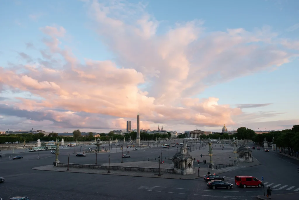 Place de la Concorde in Paris at sunset with the Egyptian obelisk and surrounding landmarks